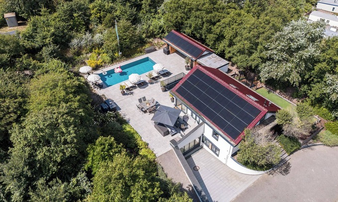 Ouddorp House | Luxury 18-person vacation villa with swimming pool, sauna, play area, veranda, lounge set, game room and BBQ