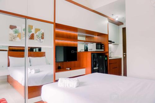 Ciputat Apartment | Luxury and Modern Studio at Transpark Bintaro Apartment By Travelio