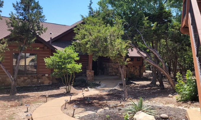 Leander Cabin | Luxury Awaits At The Wooded Bliss Cabin of Lake Travis