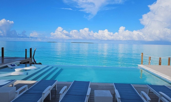 Tar Bay House | Luxury beachfront home, Heated private pool, Five King suites w/ensuite baths!