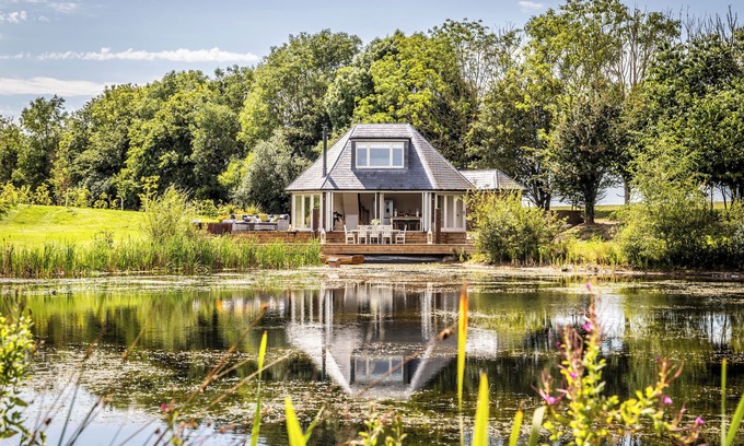 Barns Green House | Luxury Boathouse situated on a private lake, with panoramic views and a hot tub.