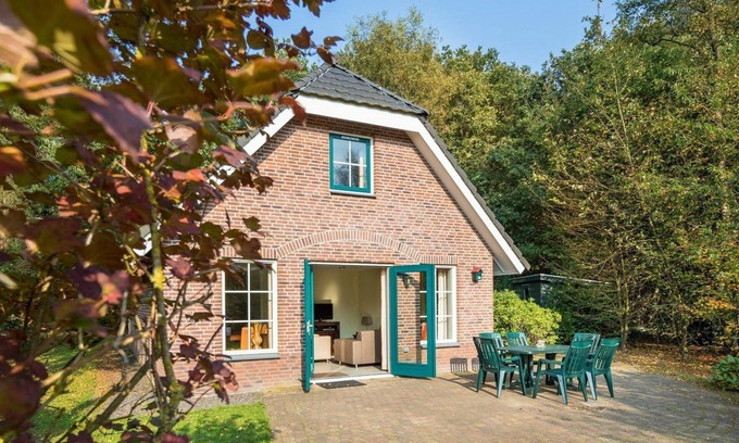 Hooghalen House | Luxury bungalow with open kitchen, spacious terrace, 3 bedrooms, 2 bathrooms, and optional sauna.