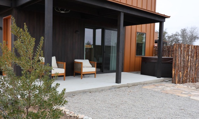 Stonewall Cabin | Luxury cabin in the center of the Texas Wine Country; large private porch w/hot tub, gas grill and fire pit; pet friendly