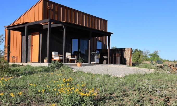 Stonewall Cabin | Luxury cabin in the center of the Texas Wine Country; large private porch w/hot tub, gas grill and fire pit; pet friendly