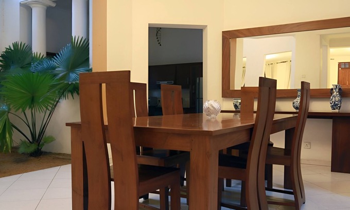 Thalawatugoda Villa | Luxury Colombo Escape- Spacious villa with landscaped gardens & library