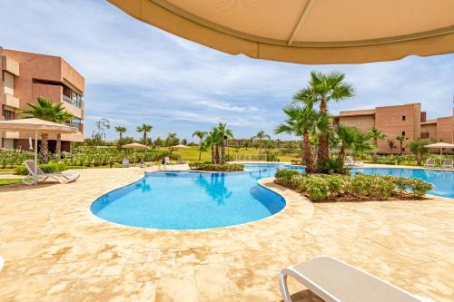 Menara Apartment | Luxury Garden-Level Apartment with Poolside Serenity