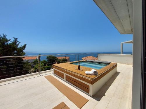 Fertilia Villa | Luxury Seafront Villa with Rooftop Pool & Stunning Sea Views