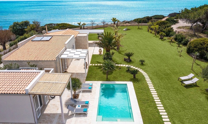 Santa Maria del Focallo Villa | Luxury villa with pool, beach front, Porto Ulisse