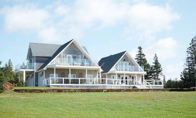 Clinton House | Luxury Water View Home With 2 Living Spaces, Hot Tub & Access To River