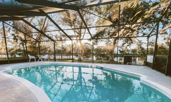 Iona House | Luxury Waterfront Home with Pool. Minutes to Sanibel & Fort Myers Beach.