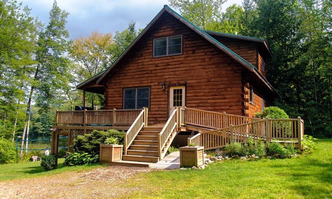 Dryden Cabin | Maine Lakeside log cabin: 3bed 2bath: hot tub-boats-swim raft-firepit- privacy!
