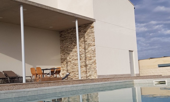 Puiggros House | MARIA DOLORS HOUSE WITH SALT SWIMMING POOL AND GARDEN