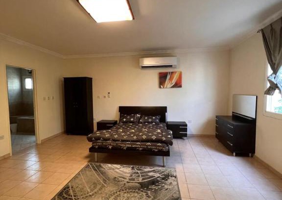 Doha Apartment | Master bedroom with entertaining facilities & Swimming pool