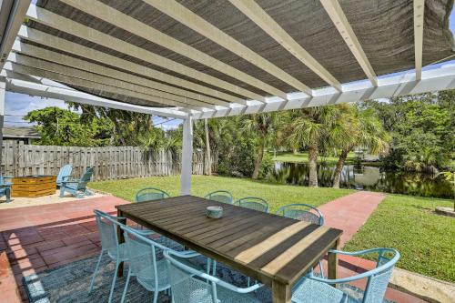 Fowlers House | Merritt Island Home Fire Pit and Canal Access!