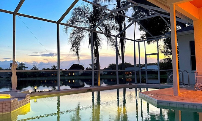Naples House | Million dollar lake views; 4-bed 3 bath pool house- Old World Charm in Naples FL