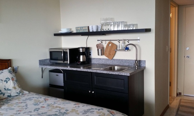 Weirs Beach Apartment | Million Dollar View of Lake Winnipesaukee with KitchenettenFlexible check in/out