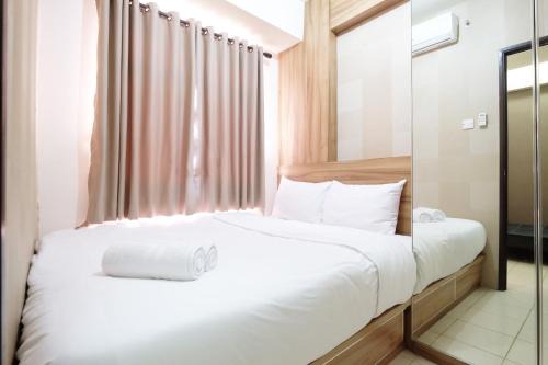 Serpong Apartment | Minimalist 2BR Serpong Greenview Apartment By Travelio