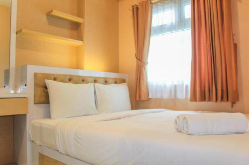 Rawasari Apartment | Minimalist and Homey 2BR Aparment at Green Pramuka near Mall By Travelio