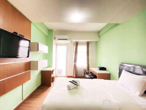 Cileunyi Apartment | Minimalist Studio Apartment at Oxford Jatinangor By Travelio