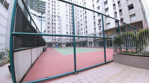 Pluit Apartment | Minimalist Studio (No Kitchen) at Green Bay Pluit Apartment By Travelio