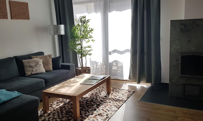 Flattach Apartment | Modern 75m² apartment for 2 to 5 people with fireplace and beautiful mountain views!