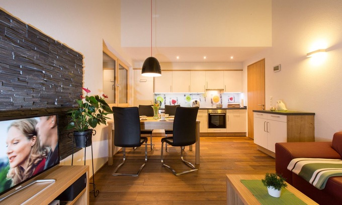 Mellau Apartment | Modern apartment with all the trimmings: sauna, carport, ski room etc.