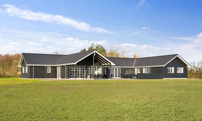 Frørup House | Modern holiday home with sea views and pool and activity room, WiFi and oven
