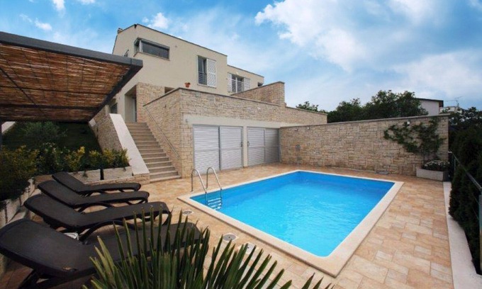Brnobici House | Modern holiday home with pool and fantastic views over nature to the sea