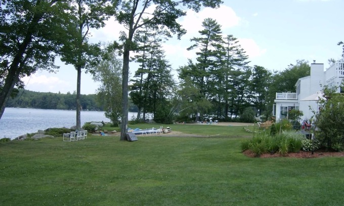 Meredith House | Modern lakefront home on Lake Waukewan with spectacular fall folliage views!