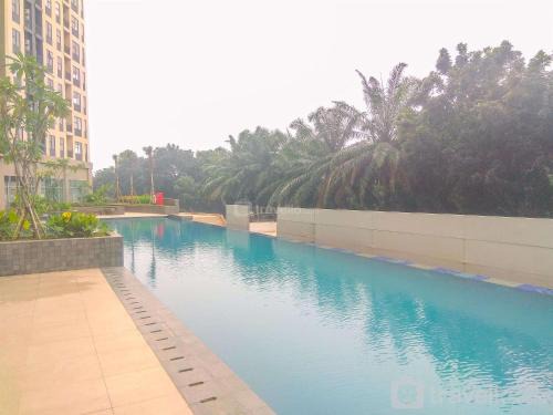 Depok Apartment | Modern Look and Homey 2BR Transpark Cibubur Apartment near Mall By Travelio