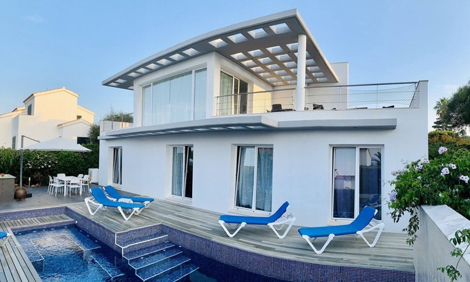 Binisafua Villa | Modern luxury villa with pool and stunning sea views.