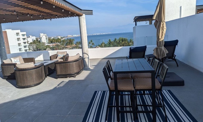 Bucerias Apartment | Modern penthouse with private terrace -18 unit bldg- 1/2 block from the beach.