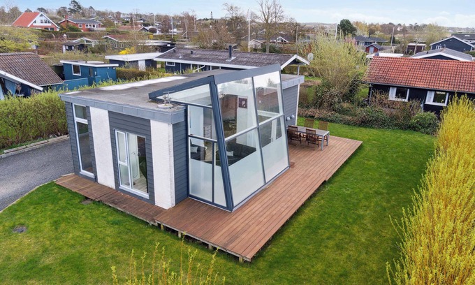 Frolunde House | Modern summer house with fantastic skylight.