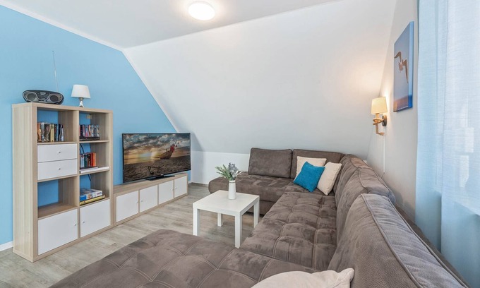 Loddin Apartment | Modern vacation apartment in Loddin with garden, WLAN & playground - quiet and on the beach