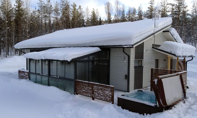 Sonka Cottage | Modern Villa Lumikko with outdoor hot tub.