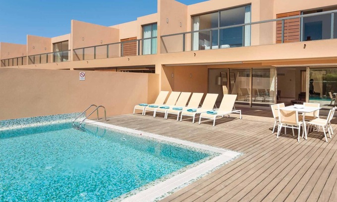 Salgados Villa | Modern villa with two spacious bedrooms.