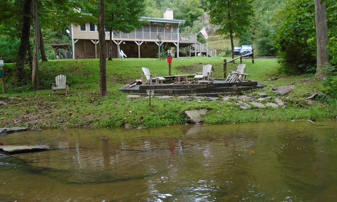 Ellijay Cabin | Mountain Resort Cabin, Private, screened porch overlooking wide peaceful creek.