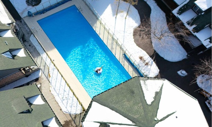 Canmore Ski Chalet | MTN Chalet: Year-round Pool w/Hot Tub, BBQ, AC; 2BR-2BA, Walk anywhere in 15 min