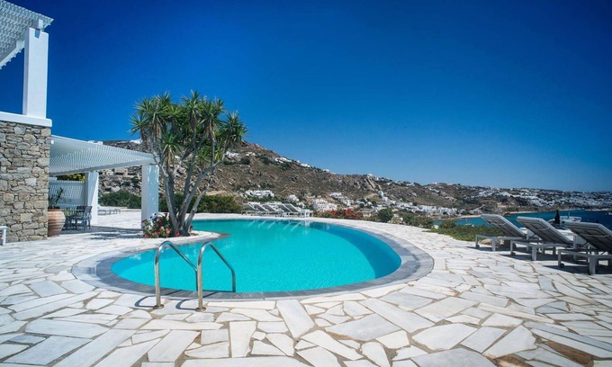 Tourlos Villa | My Rental Homes - Villa Rose 1, only 1 km from Agios Stefanos beach. Shared pool