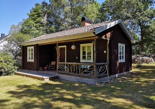 Froseke House | Mysig stuga med öppen spis och uteplats