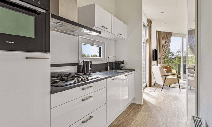 Aalst Ski Chalet | ✓ Natuurlodge at Recreatiepark het Esmeer ✓ Holiday home for 4 persons ✓ Located in Aalst (Gelderland) ✓ Waterside holiday park ✓ Book directly through the park