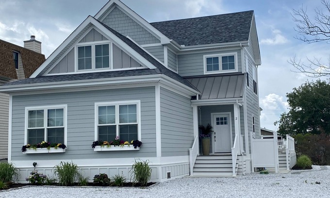 Fenwick Island House | New 5 bedroom & 6 bathroom waterfront home on canal with pool close to beach!