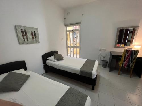 Tal-Ibrag House | New Aurora Room 4, Cozy Double, Shared Bath
