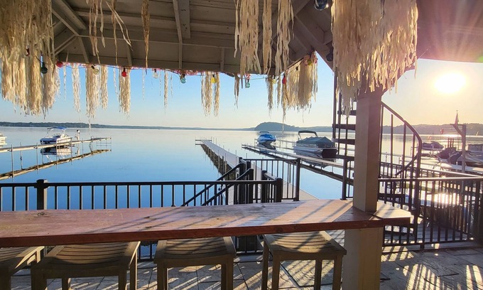 Malta Condo | New-First floor lakefront, 160 ft dock, 2 minutes to Browns Beach & Restaurants!
