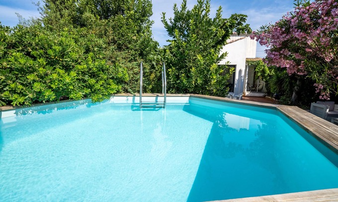 Perols House | New house, swimming pool, 5 mn from the beach, superb view of the lake, 6/8 pers