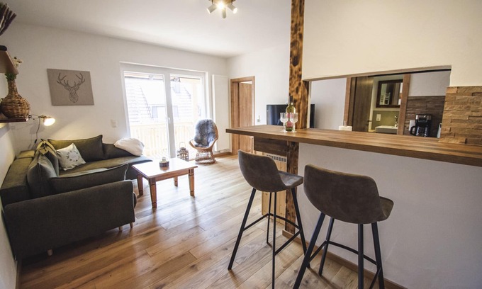 Bischofsheim an der Rhon Apartment | New, romantic Rotmilan holiday apartment with a view of the mountains