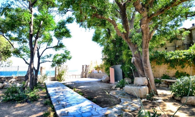 Ikaria Apartment | New,uniquely cozy place,waterfront garden,actual steps to crystal clear beach -