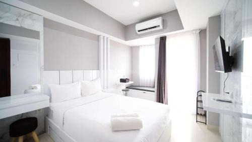 Surabaya Apartment | Nice and Comfy Studio Grand Dharmahusada Lagoon Apartment By Travelio