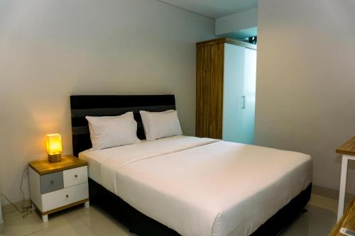 Old Jakarta Apartment | Nice and Elegant 2BR Apartment at Springhill Terrace Residence By Travelio