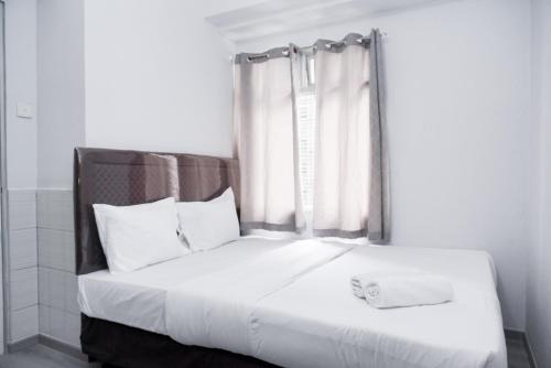 Pluit Apartment | Nice and Simply 2BR at Green Bay Pluit Apartment By Travelio